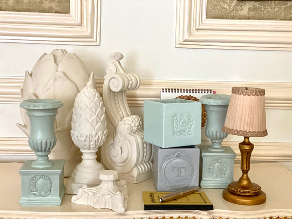 Pencil holders with tympanum