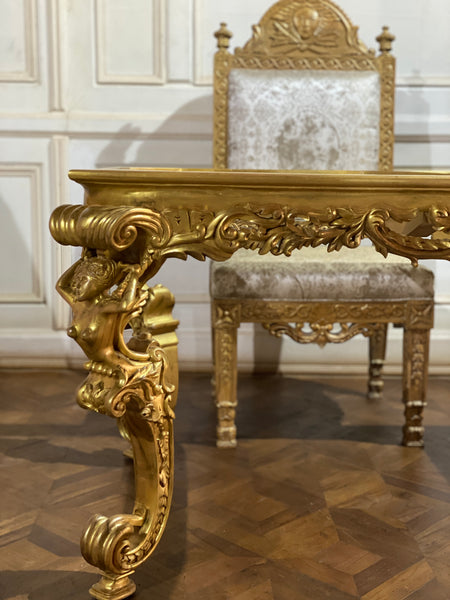 Dining table inspired by Louis XIV antiquity with caryatids.
