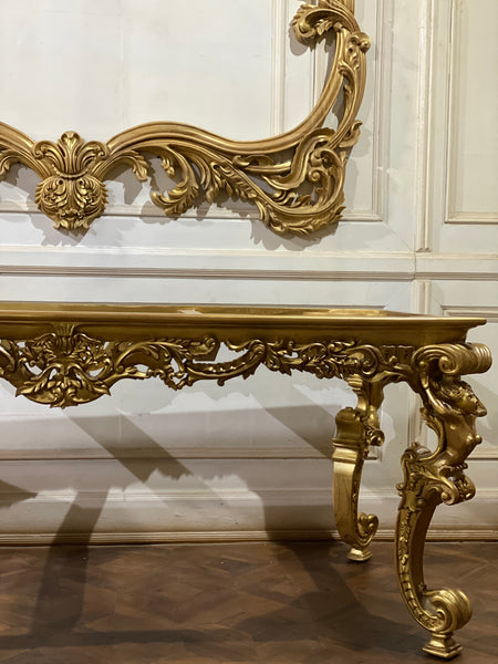 Dining table inspired by Louis XIV antiquity with caryatids.