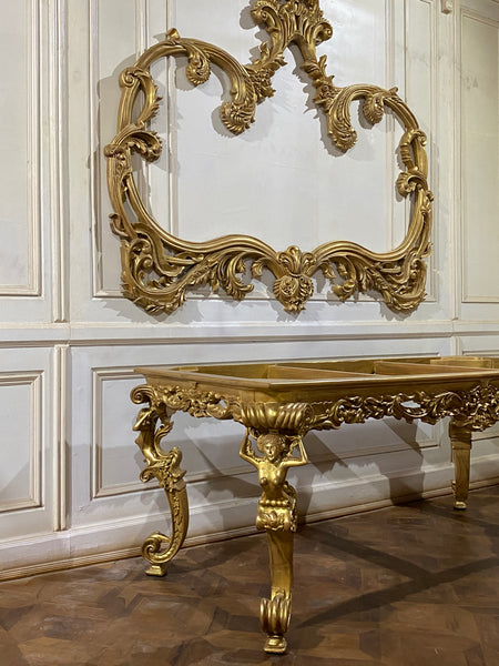Dining table inspired by Louis XIV antiquity with caryatids.