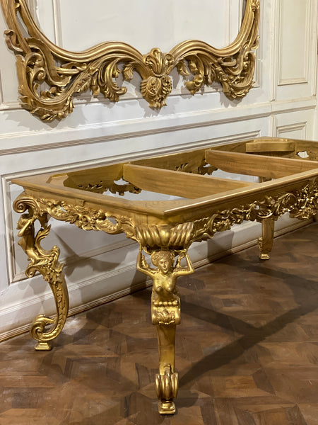 Dining table inspired by Louis XIV antiquity with caryatids.