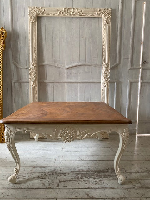 Louis XV center table with reverse scrolls