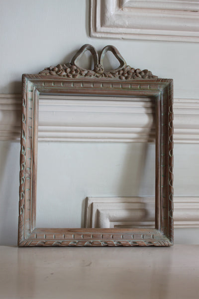 Frame in square shape from The Unfurling with delicate ribbon