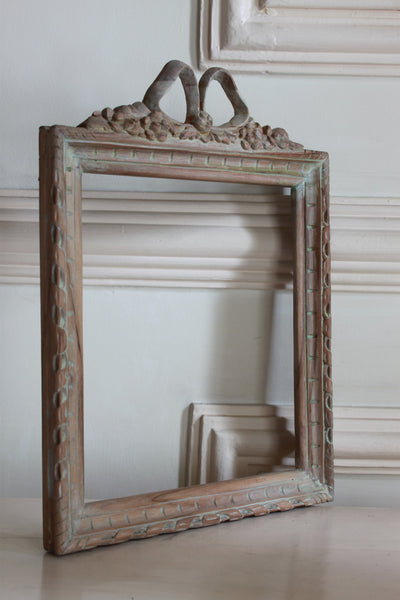 Frame in square shape from The Unfurling with delicate ribbon