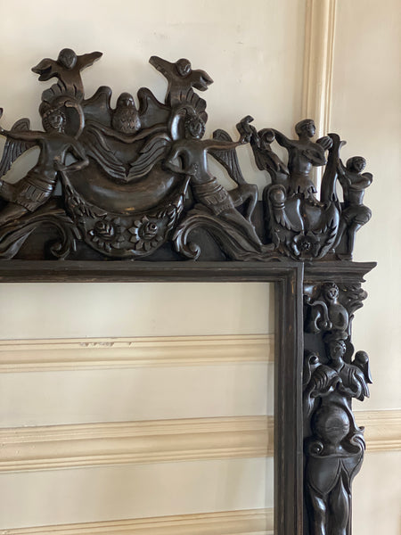 Renaissance frame with arabesques, angels, birds and grotesques