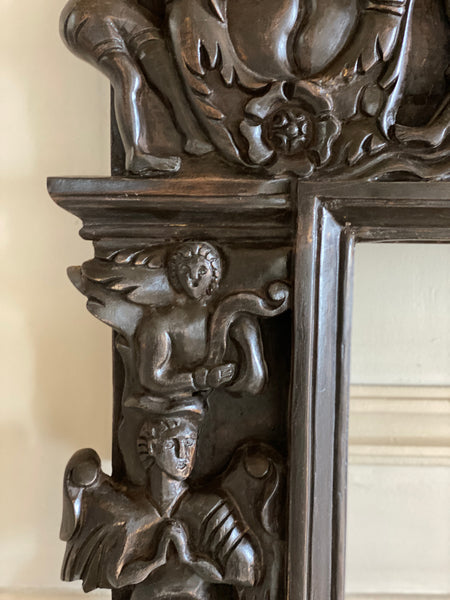 Renaissance frame with arabesques, angels, birds and grotesques