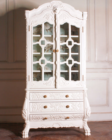 French Renaissance inspired armoire with lion motif
