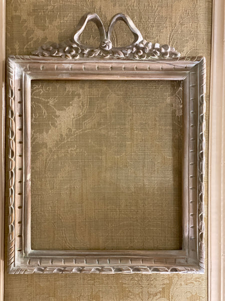 Frame in square shape from The Unfurling with delicate ribbon