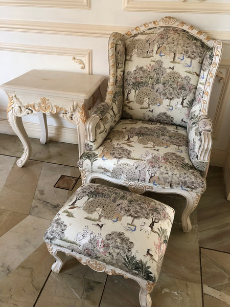 Upholstered wing chair of Louis XV elegance