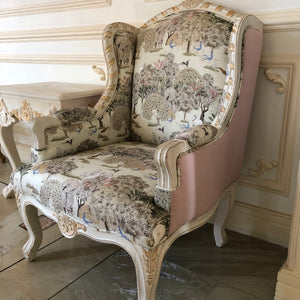 Upholstered wing chair of Louis XV elegance