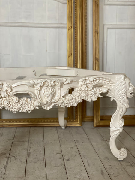 Louis XV center table with lion heads and rare scrolls