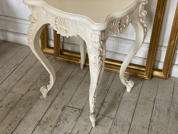 Louis XV side table with dramatic cockle