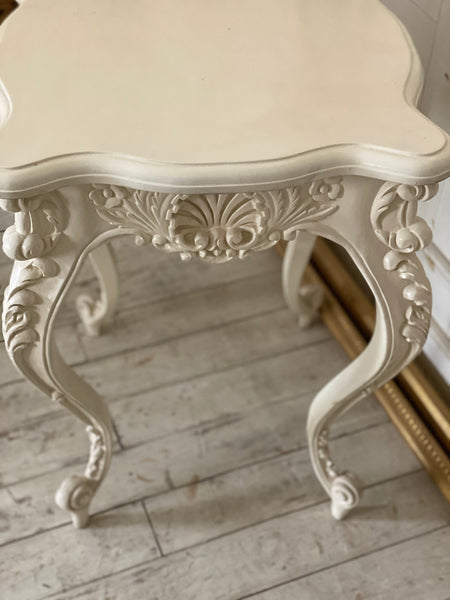 Louis XV side table with dramatic cockle