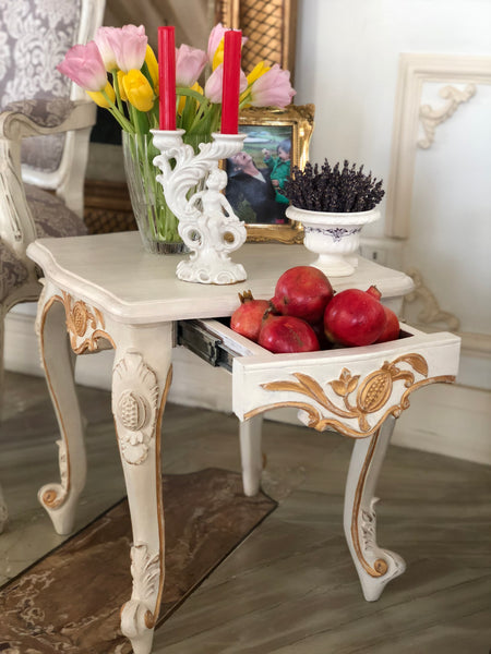 Side table of Louis XV elegance with pomegranate motif