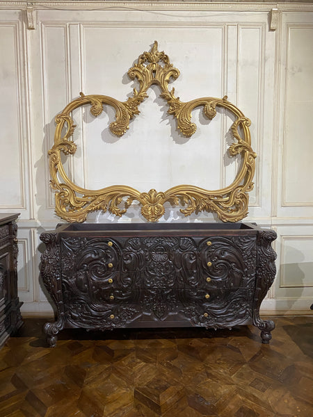 Surreal bombé commode with dramatic rococo scrolls