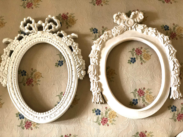 Frame from The Unfurling with intricate ribbon in oval