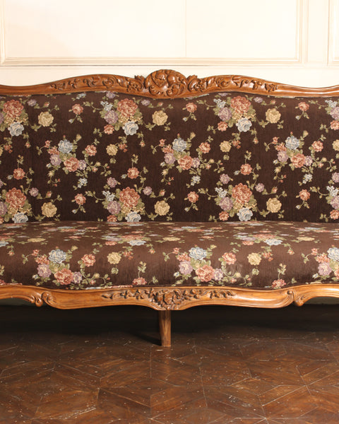 Sofa of significant Louis XV features, seating for five