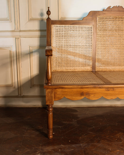 Elegant settee with Caning