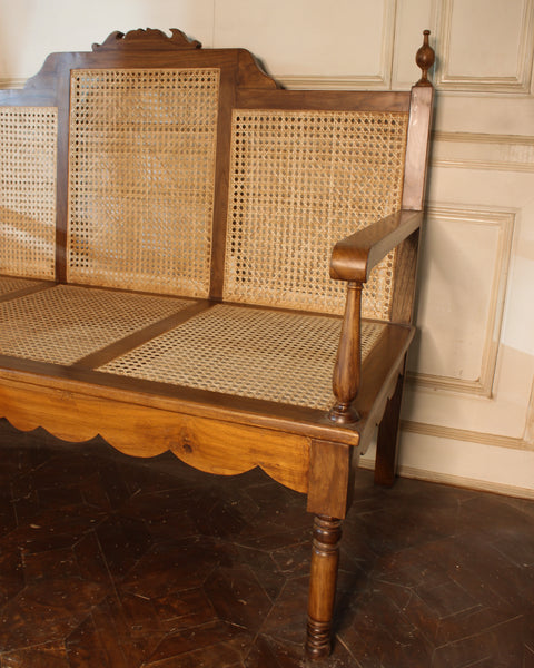 Elegant settee with Caning