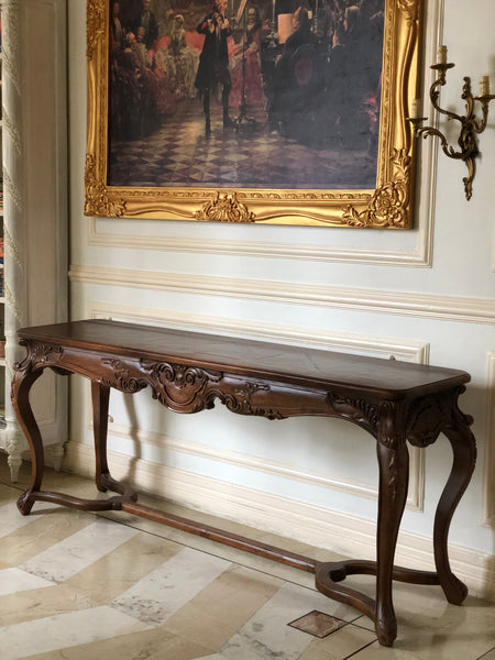 Console of sleek rococo grace