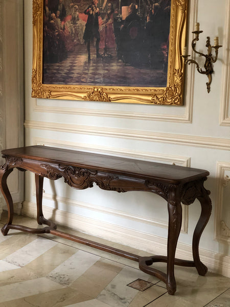 Console of sleek rococo grace