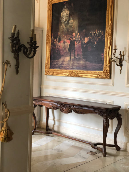Console of sleek rococo grace