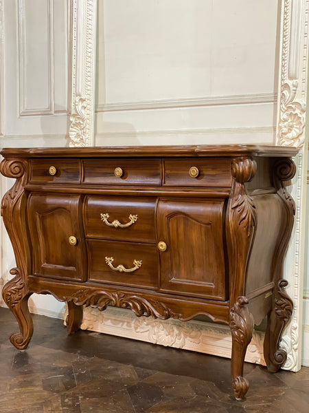 Fabled commode of Louis XV features