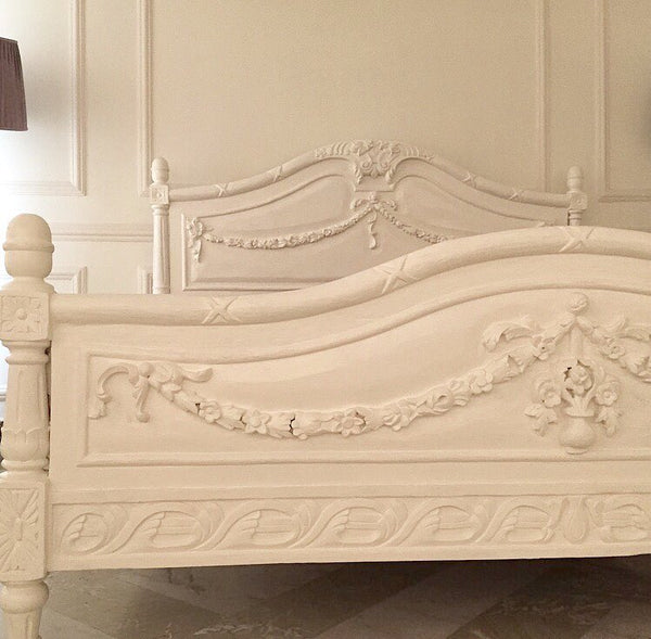 Louis XVI bed with exuberant motifs