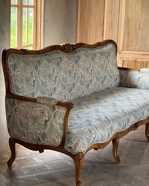 Louis XV sofa of graceful curves