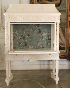 Louis XVI secrétaire with traditional motifs