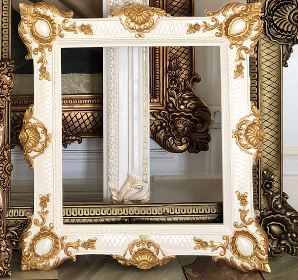 Frames of oversized proportions and rococo elements inspired by Louis XV