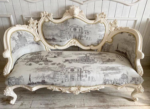 Louis XV sofa with lions and cornucopia