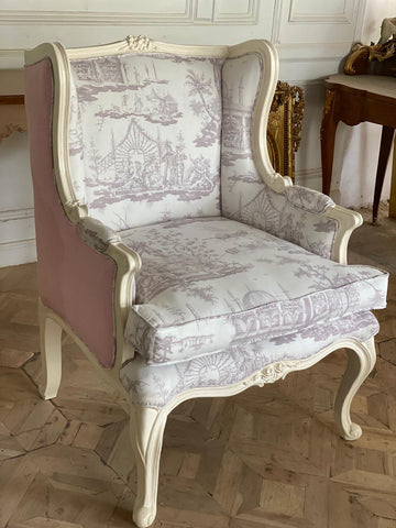 Louis XV wingback chair with transitional motifs