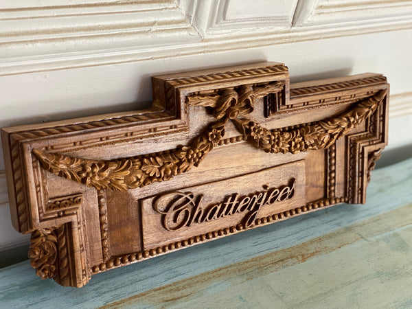 Nameplate in a neoclassical style