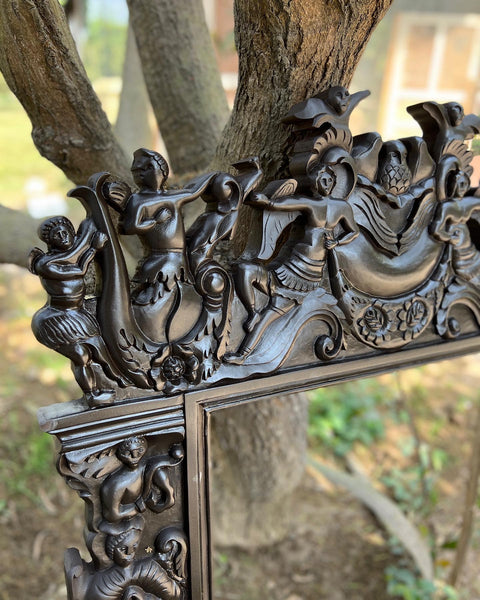 Renaissance frame with arabesques, angels, birds and grotesques