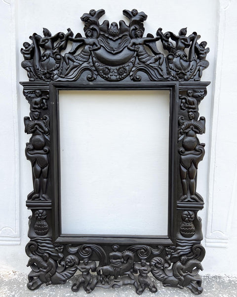 Renaissance frame with arabesques, angels, birds and grotesques