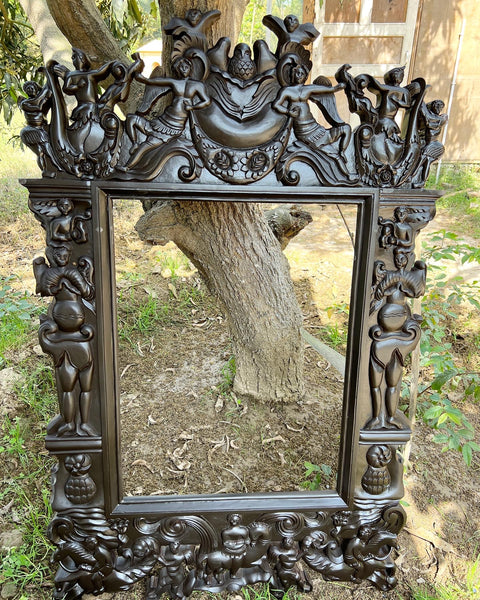 Renaissance frame with arabesques, angels, birds and grotesques